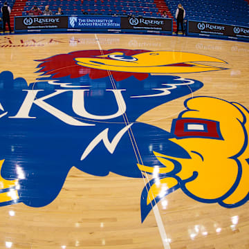 Jan 21, 2023; Lawrence, Kansas, USA;  Kansas Jayhawks logo at mid court prior to the game between the Kansas Jayhawks and the TCU Horned Frogs at Allen Fieldhouse. Mandatory Credit: William Purnell-Imagn Images