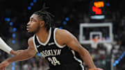Oct 26, 2025; San Antonio, Texas, USA; Brooklyn Nets guard Cam Thomas (24) dribbles against San Antonio Spurs guard Devin Vassell (24) in the second half at Frost Bank Center. Mandatory Credit: Daniel Dunn-Imagn Images