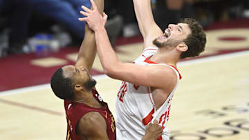 Jan 25, 2025; Cleveland, Ohio, USA; Cleveland Cavaliers forward Evan Mobley (4) defends against Houston Rockets center Alperen Sengun (28) in the fourth quarter at Rocket Mortgage FieldHouse. Mandatory Credit: David Richard-Imagn Images