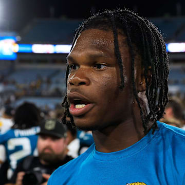 Jacksonville Jaguars wide receiver Travis Hunter (12) walks on the field to greet players after the game of an NFL preseason matchup at EverBank Stadium, Saturday, Aug. 9, 2025 in Jacksonville, Fla. The Steelers defeated the Jaguars 31-25. [Corey Perrine/Florida Times-Union]