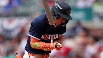 Jul 12, 2025; Atlanta, GA, USA;  National League infielder Konnor Griffin (28) is hit by a ball during the seventh inning against American League at Truist Park. Mandatory Credit: Brett Davis-Imagn Images