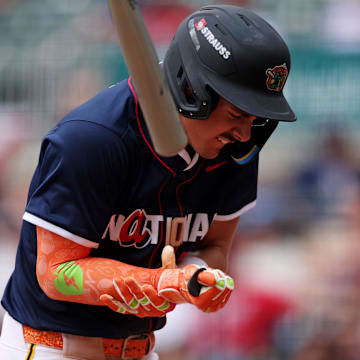 Jul 12, 2025; Atlanta, GA, USA;  National League infielder Konnor Griffin (28) is hit by a ball during the seventh inning against American League at Truist Park. Mandatory Credit: Brett Davis-Imagn Images