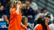 Mar 22, 2025; Storrs, Connecticut, USA; Oklahoma State Cowgirls head coach Jacie Hoyt watches from the sideline as they take on the South Dakota State Jackrabbits at Harry A. Gampel Pavilion. Mandatory Credit: David Butler II-Imagn Images