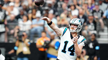 Sep 22, 2024; Paradise, Nevada, USA; Carolina Panthers quarterback Andy Dalton (14) makes a pass attempt against the Las Vegas Raiders during the second quarter at Allegiant Stadium. Mandatory Credit: Stephen R. Sylvanie-Imagn Images