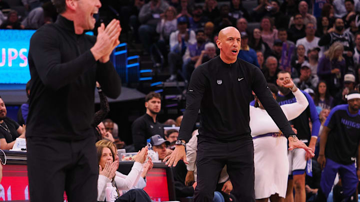 Mar 19, 2025; Sacramento, California, USA; Sacramento Kings interim head coach Doug Christie gestures from the sideline behind Cleveland Cavaliers head coach Kenny Atkinson during the third quarter at Golden 1 Center. Mandatory Credit: Kelley L Cox-Imagn Images
