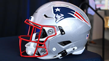 Jan 17, 2024; Foxborough, MA, USA; A New England Patriots helmet sits on a table prior to a press conference at Gillette Stadium. Mandatory Credit: Eric Canha-Imagn Images