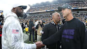 Nov 17, 2024; Pittsburgh, Pennsylvania, USA;  Pittsburgh Steelers head coach Mike Tomlin (left) and Baltimore Ravens head coach John Harbaugh (right) shake hands after the game at Acrisure Stadium. Mandatory Credit: Charles LeClaire-Imagn Images