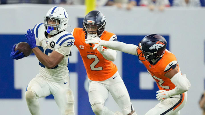 Indianapolis Colts running back Jonathan Taylor (28) rushes the ball Sunday, Sept. 14, 2025, during a game against the Denver Broncos at Lucas Oil Stadium in Indianapolis.