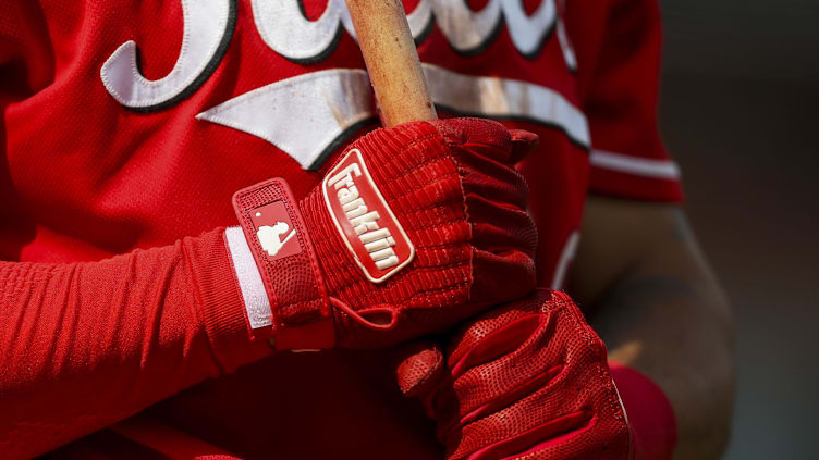 The gloves of Cincinnati Reds shortstop Jose Barrero.