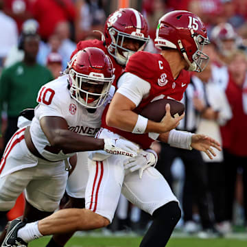 Nov 15, 2025; Tuscaloosa, Alabama, USA;  Oklahoma Sooners linebacker Kip Lewis (10) pressures Alabama Crimson Tide quarterback Ty Simpson (15) during the first half at Saban Field at Bryant-Denny Stadium. Mandatory Credit: David Leong-Imagn Images