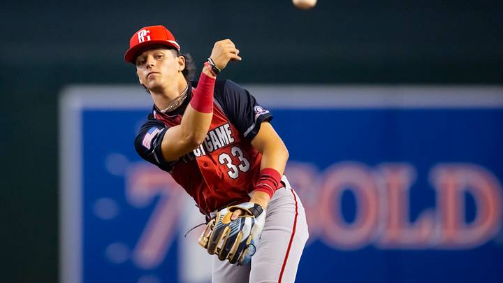 Aug 28, 2022; Phoenix, Arizona, US; West infielder Roch Cholowsky (33) during the Perfect Game All-American Classic high school baseball game at Chase Field. Mandatory Credit: Mark J. Rebilas-USA TODAY Sports