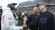 Nov 17, 2024; Pittsburgh, Pennsylvania, USA;  Pittsburgh Steelers head coach Mike Tomlin (left) and Baltimore Ravens head coach John Harbaugh (right) shake hands after the game at Acrisure Stadium. Mandatory Credit: Charles LeClaire-Imagn Images