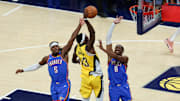 Jun 19, 2025; Indianapolis, Indiana, USA; Indiana Pacers forward Pascal Siakam (43) shoots the ball defended by Oklahoma City Thunder guard Luguentz Dort (5) and Oklahoma City Thunder forward Jalen Williams (8) in the second quarter during game six of the 2025 NBA Finals at Gainbridge Fieldhouse. Mandatory Credit: Trevor Ruszkowski-Imagn Images