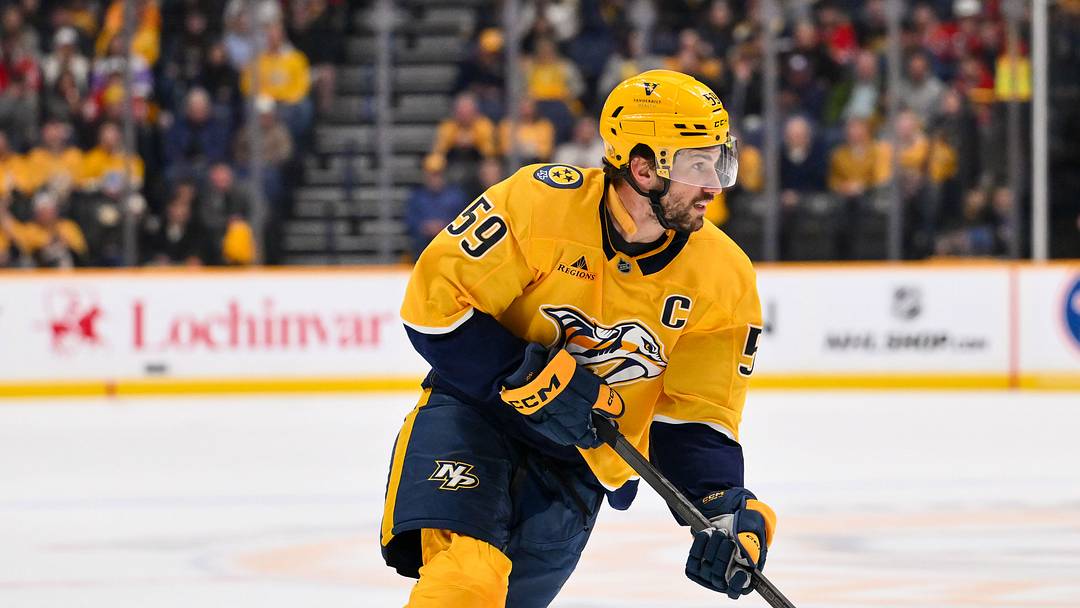 Feb 26, 2026; Nashville, Tennessee, USA;  Nashville Predators defenseman Roman Josi (59) skates with the puck against the Chicago Blackhawks during the first period at Bridgestone Arena. Mandatory Credit: Steve Roberts-Imagn Images