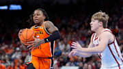 Oklahoma State Cowboys guard Khalil Brantley (5) gathers the ball beside Oklahoma Sooners guard Dayton Forsythe (7) during a men's college Bedlam basketball game between the University of Oklahoma Sooners (OU) and the Oklahoma State University Cowboys (OSU) at Paycom Center in Oklahoma City, Saturday, Dec. 14, 2024. Oklahoma won 80-65.