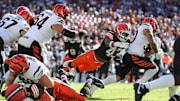 Cleveland Browns linebacker Mohamoud Diabate (43) makes a diving attempt for Cincinnati Bengals running back Chase Brown (30) during the second half of an NFL football game at Huntington Bank Field, Sunday, Oct. 20, 2024, in Cleveland, Ohio.