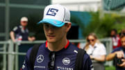 May 5, 2024; Miami Gardens, Florida, USA; Williams driver Logan Sargeant (2) walks into the F1 Village before the F1 Miami Grand Prix at Miami International Autodrome. Mandatory Credit: Peter Casey-USA TODAY Sports