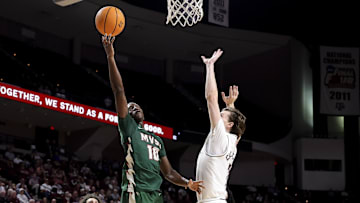 Nov 25, 2025; College Station, Texas, USA; Mississippi Valley State Delta Devils guard Michael James (10) shoots the ball as Texas A&M Aggies forward Zach Clemence (7) during the second half at Reed Arena. Mandatory Credit: Maria Lysaker-Imagn Images 