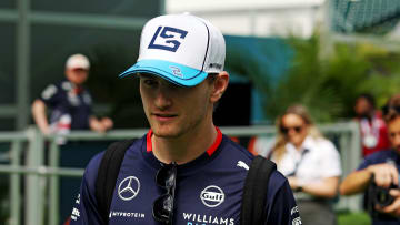 May 5, 2024; Miami Gardens, Florida, USA; Williams driver Logan Sargeant (2) walks into the F1 Village before the F1 Miami Grand Prix at Miami International Autodrome. Mandatory Credit: Peter Casey-USA TODAY Sports