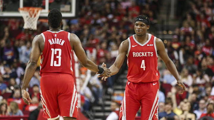 Houston Rockets forward Danuel House Jr. (4) and guard James Harden (13) against the Phoenix Suns at Toyota Center. 