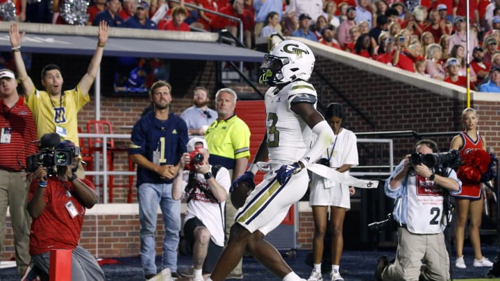 Sep 16, 2023; Oxford, Mississippi, USA; Georgia Tech Yellow Jackets wide receiver Eric Singleton, Jr. (13) scores  a touchdown during the second half against the Mississippi Rebels at Vaught-Hemingway Stadium. Mandatory Credit: Petre Thomas-USA TODAY Sports