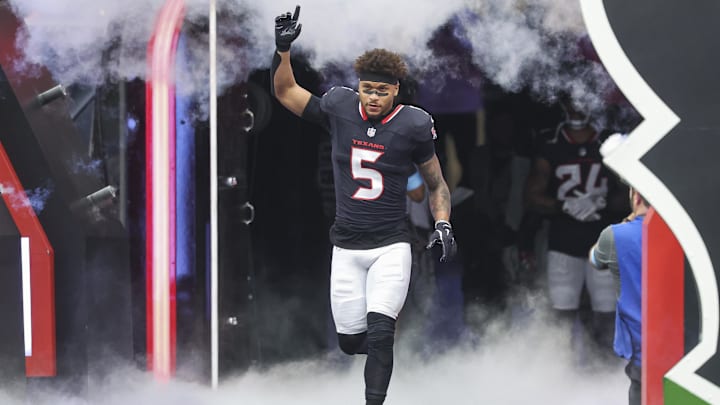 Oct 27, 2024; Houston, Texas, USA; Houston Texans safety Jalen Pitre (5) runs onto the field before the game against the Indianapolis Colts at NRG Stadium. Mandatory Credit: Troy Taormina-Imagn Images