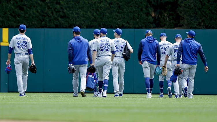 Jun 12, 2022; Detroit, Michigan, USA;  Toronto Blue Jays pitchers walk to the bullpen 