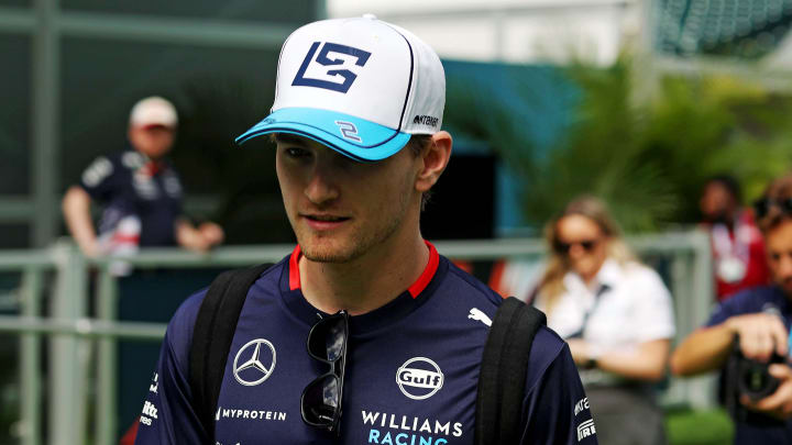 May 5, 2024; Miami Gardens, Florida, USA; Williams driver Logan Sargeant (2) walks into the F1 Village before the F1 Miami Grand Prix at Miami International Autodrome. Mandatory Credit: Peter Casey-USA TODAY Sports