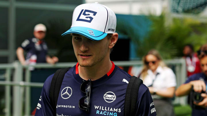 May 5, 2024; Miami Gardens, Florida, USA; Williams driver Logan Sargeant (2) walks into the F1 Village before the F1 Miami Grand Prix at Miami International Autodrome. Mandatory Credit: Peter Casey-USA TODAY Sports