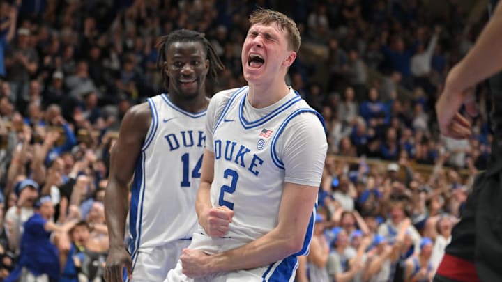 The Mavs title odds aren't improved after picking Cooper Flagg (right) with the first overall pick. 