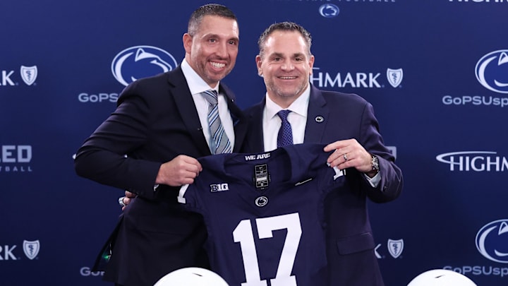 Matt Campbell, left,  and Penn State University athletic director Pat Kraft