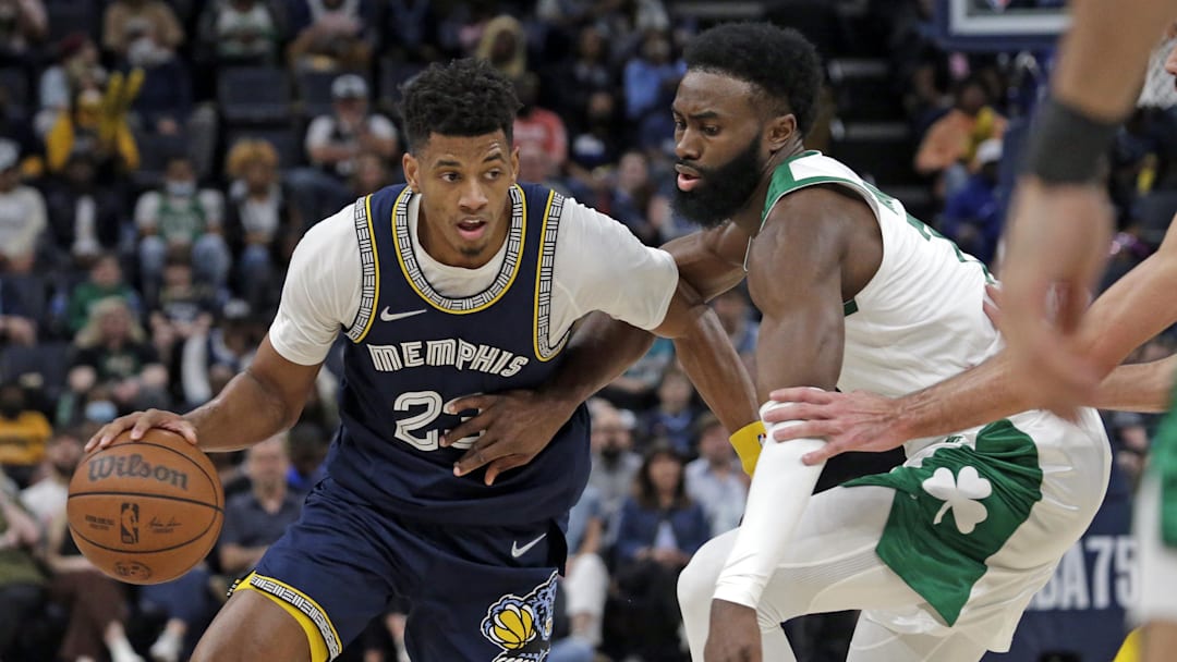 Apr 10, 2022; Memphis, Tennessee, USA; Memphis Grizzlies guard Jarrett Culver (23) drives to the basket as Boston Celtics guard  Jaylen Brown(7) defends during the first half at FedExForum. Mandatory Credit: Petre Thomas-Imagn Images