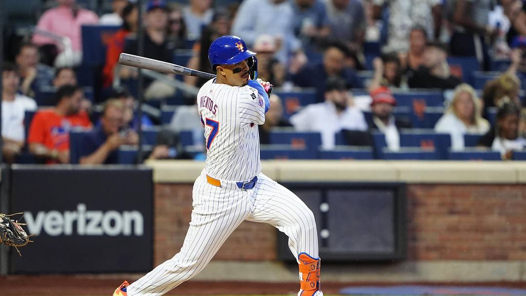 Aug 19, 2024; New York City, New York, USA; New York Mets third baseman Mark Vientos (27) hits a single against the Baltimore Orioles during the first inning at Citi Field. Mandatory Credit: Gregory Fisher-USA TODAY Sports