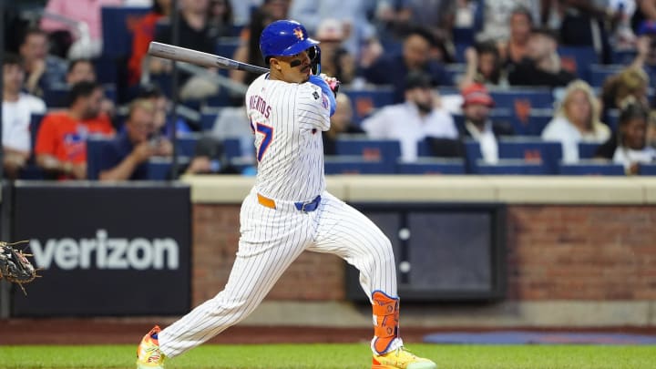 Aug 19, 2024; New York City, New York, USA; New York Mets third baseman Mark Vientos (27) hits a single against the Baltimore Orioles during the first inning at Citi Field. Mandatory Credit: Gregory Fisher-USA TODAY Sports