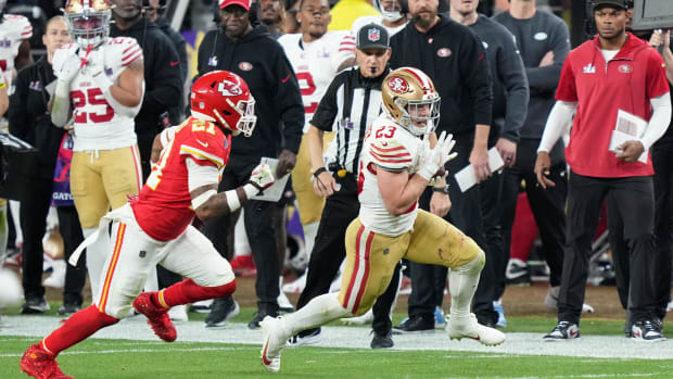 Christian McCaffrey evades a defender