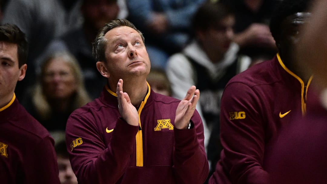Dec 10, 2025; West Lafayette, Indiana, USA; Minnesota Golden Gophers head coach Niko Medved looks up at the video board during the first half against the Purdue Boilermakers at Mackey Arena. Mandatory Credit: Marc Lebryk-Imagn Images Dec 10, 2025; West Lafayette, Indiana, USA; Minnesota Golden Gophers head coach Niko Medved looks up at the video board during the first half against the Purdue Boilermakers at Mackey Arena. Mandatory Credit: Marc Lebryk-Imagn Images