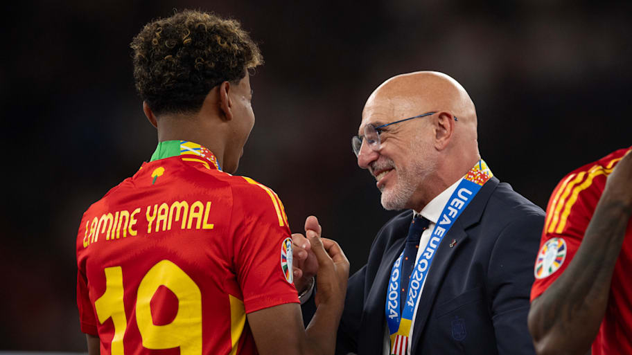Lamine Yamal (left) and Luis de la Fuente.