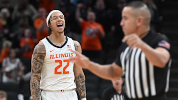 Mar 13, 2025; Indianapolis, IN, USA; Illinois Fighting Illini guard Tre White (22) celebrates after a play during the first half against the Iowa Hawkeyes at Gainbridge Fieldhouse. Mandatory Credit: Robert Goddin-Imagn Images