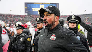 Ohio State head coach Ryan Day calls for the players and coaches to head back to the locker room after 27-9 win over Michigan at Michigan Stadium in Ann Arbor on Saturday, Nov. 29, 2025.