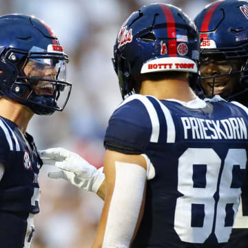 Aug 31, 2024; Oxford, Mississippi, USA; Mississippi Rebels tight end Caden Prieskorn (86) celebrates with quarterback Jaxson Dart (2) after a touchdown against the Furman Paladins during the first half at Vaught-Hemingway Stadium. Mandatory Credit: Petre Thomas-USA TODAY Sports