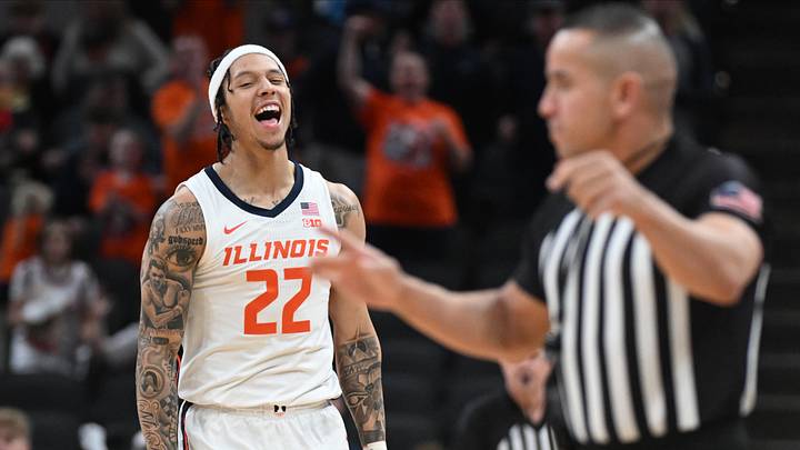 Mar 13, 2025; Indianapolis, IN, USA; Illinois Fighting Illini guard Tre White (22) celebrates after a play during the first half against the Iowa Hawkeyes at Gainbridge Fieldhouse. Mandatory Credit: Robert Goddin-Imagn Images