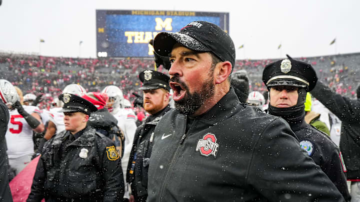 Ohio State head coach Ryan Day calls for the players and coaches to head back to the locker room after 27-9 win over Michigan at Michigan Stadium in Ann Arbor on Saturday, Nov. 29, 2025.