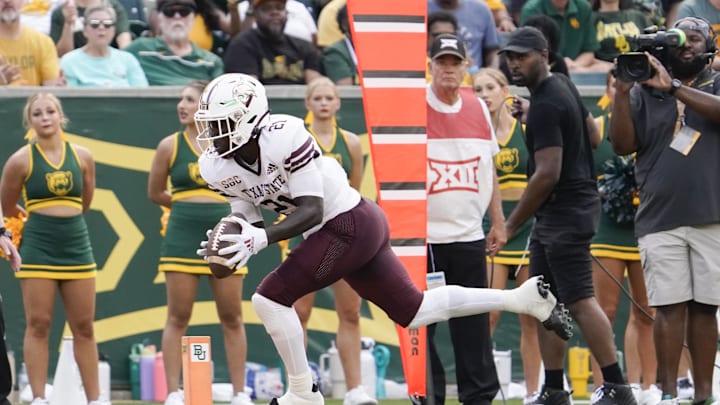 Sep 2, 2023; Waco, Texas, USA; Texas State Bobcats running back Ismail Mahdi (21) goes in for the 10-yard touchdown catch Baylor Bears during the first half at McLane Stadium. Mandatory Credit: Raymond Carlin III-Imagn Images