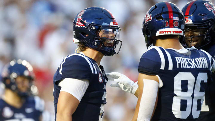 Aug 31, 2024; Oxford, Mississippi, USA; Mississippi Rebels tight end Caden Prieskorn (86) celebrates with quarterback Jaxson Dart (2) after a touchdown against the Furman Paladins during the first half at Vaught-Hemingway Stadium. Mandatory Credit: Petre Thomas-USA TODAY Sports