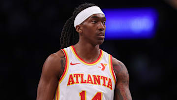 Mar 16, 2025; Brooklyn, New York, USA; Atlanta Hawks guard Terance Mann (14) looks on during the first half against the Brooklyn Nets at Barclays Center. Mandatory Credit: Vincent Carchietta-Imagn Images