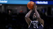 Jan 19, 2024; Cincinnati, Ohio, USA; Georgetown Hoyas forward Supreme Cook (24) shoots a free throw against the Xavier Musketeers in the second half at Cintas Center. Mandatory Credit: Katie Stratman-Imagn Images