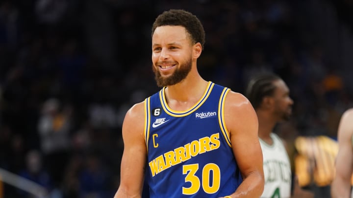 Dec 10, 2022; San Francisco, California, USA; Golden State Warriors guard Stephen Curry (30) smiles before shooting a free throw against the Boston Celtics in the fourth quarter at the Chase Center. Mandatory Credit: Cary Edmondson-USA TODAY Sports