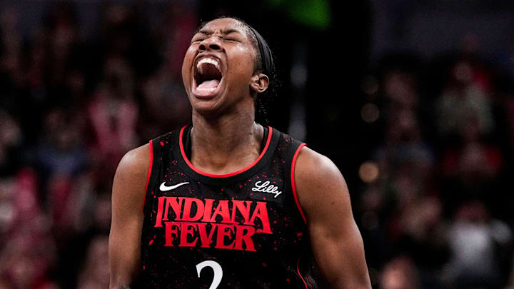 Indiana Fever guard Aari McDonald (2) yells in excitement Wednesday, July 30, 2025, during the game at Gainbridge Fieldhouse in Indianapolis.