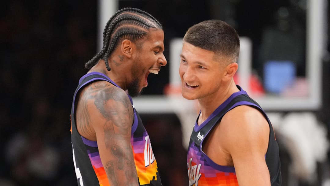 Mar 6, 2026; Phoenix, Arizona, USA; Phoenix Suns guard Jalen Green (4) celebrates with Phoenix Suns guard Grayson Allen (8) against the New Orleans Pelicans during the first half at Mortgage Matchup Center. Mandatory Credit: Joe Camporeale-Imagn Images