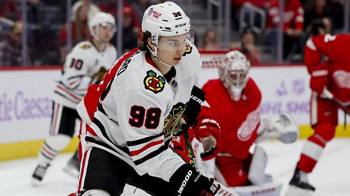 Nov 30, 2023; Detroit, Michigan, USA; Chicago Blackhawks center Connor Bedard (98) skates with the puck in the third period against the Detroit Red Wings at Little Caesars Arena. Mandatory Credit: Rick Osentoski-Imagn Images